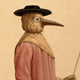 A physician wearing a 17th-century plague-preventive head covering.